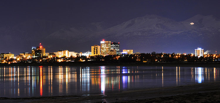 Anchorage, Alaska at night from across the water.