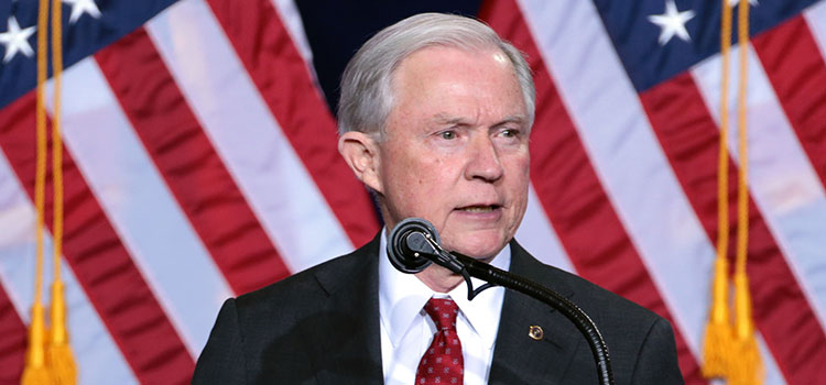 Alabama Sen. Jeff Sessions takes the stage during a Trump rally in 2016.