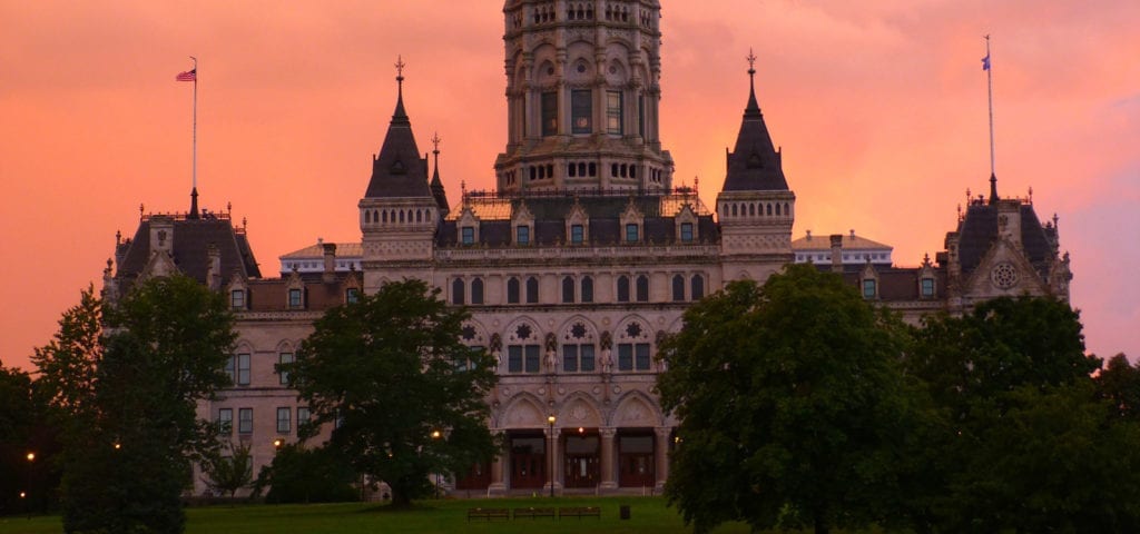 The Connecticut Capitol Building during a pink-toned sunset.