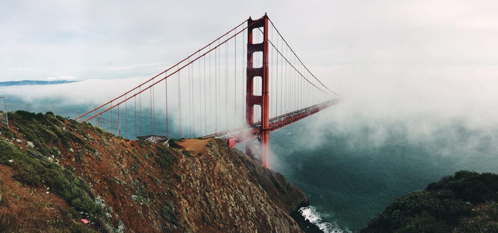The Golden Gate Bridge in San Francisco, enshrouded by fog.