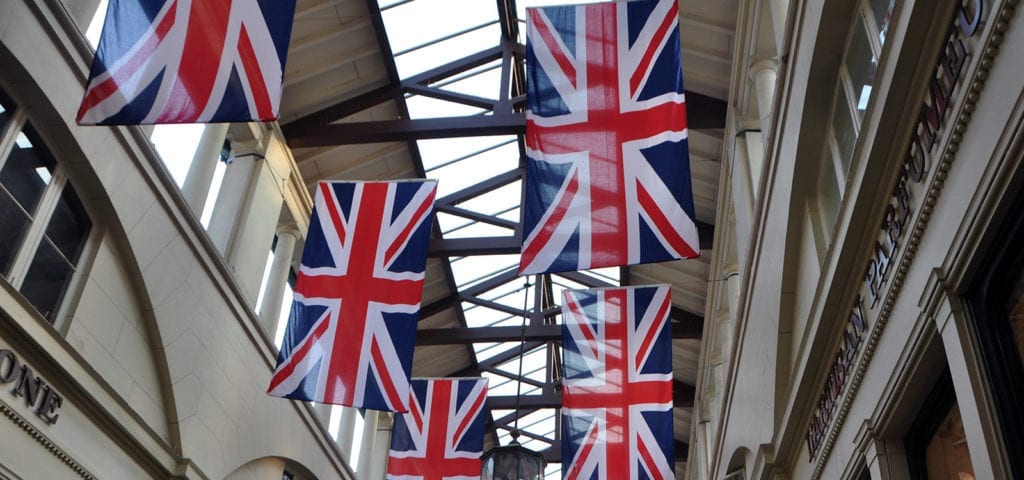 A train station walkway adorned with Union Jacks.