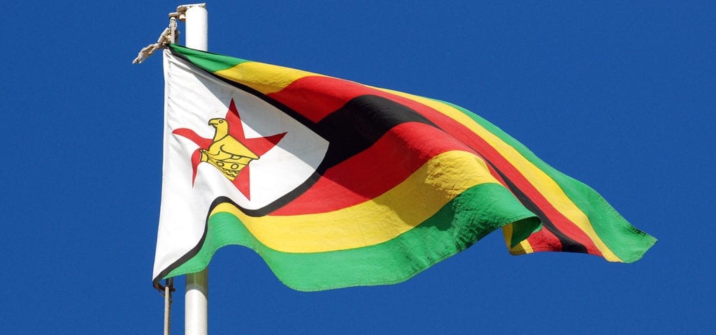 Official flag of Zimbabwe, featuring a soapstone bird and a red star.