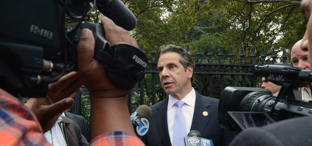 New York Gov. Andrew Cuomo answers reporters' questions during a 2014 emergency question session.