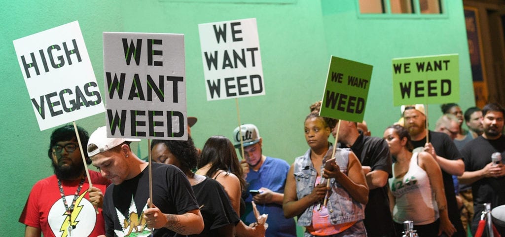 Cannabis enthusiasts line up outside of the NuLeaf dispensary in Las Vegas, Nevada on the night of first adult-use sales.