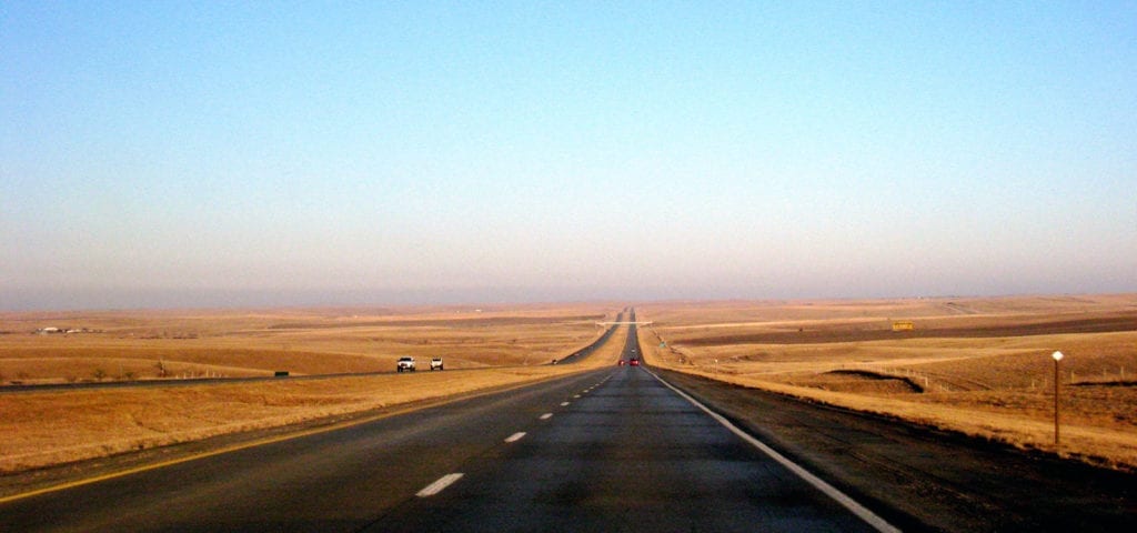 A long, dusty road in sunny South Dakota.