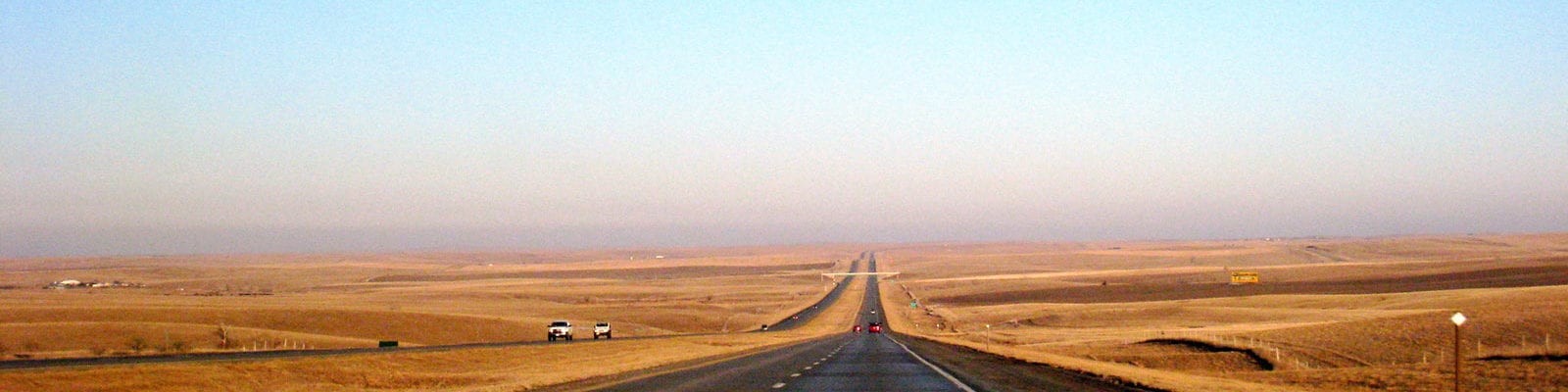 A long, dusty road in sunny South Dakota.