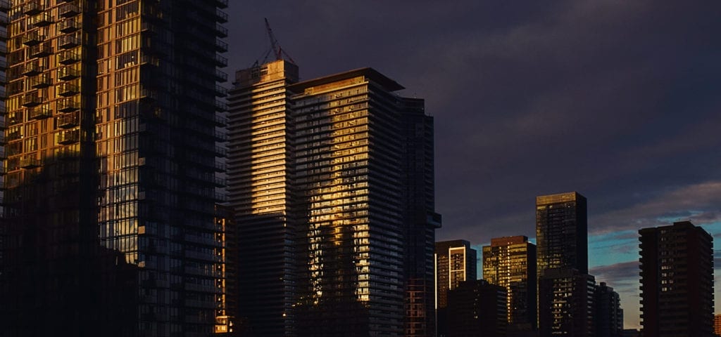 Dusk photograph of buildings under construction in Toronto, Ontario, Canada.