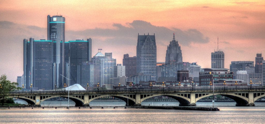 Detroit skyline pictured from a boat on the river.