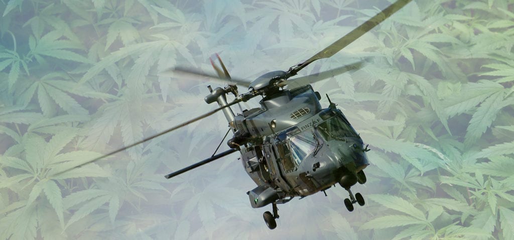 A police helicopter commonly used in the DEA's cannabis eradication program.