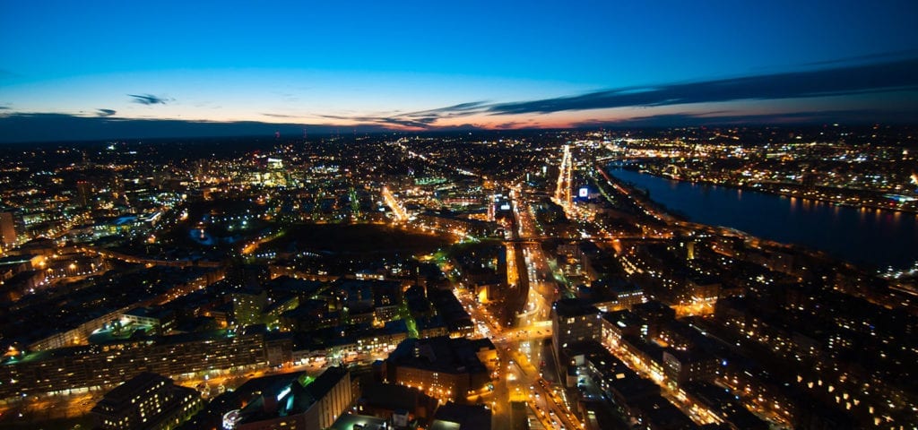 An aerial, nighttime photograph of Boston, Massachusetts.