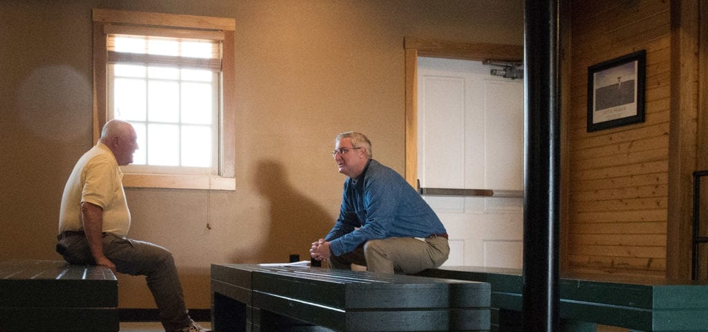 U.S. Department of Agriculture (USDA) Secretary Sonny Perdue and Governor Eric J. Holcomb have a one-on-one discussion in the Normandy Barn, at the Indiana State Fairgrounds,