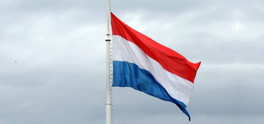 The official red, white, and blue flag of Luxembourg.