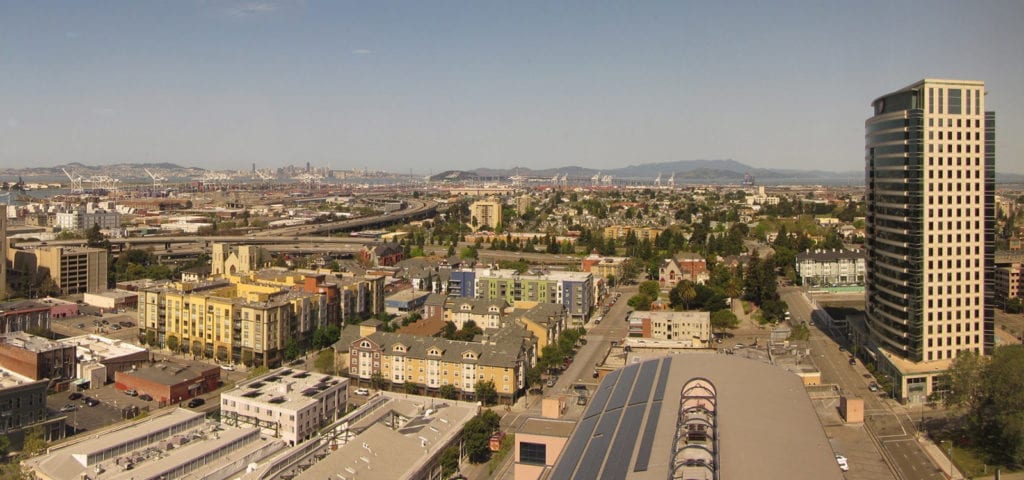 Skyline view of Oakland, California on a clear, sunny day.