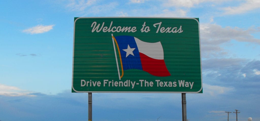A road sign that says "Welcome to Texas."