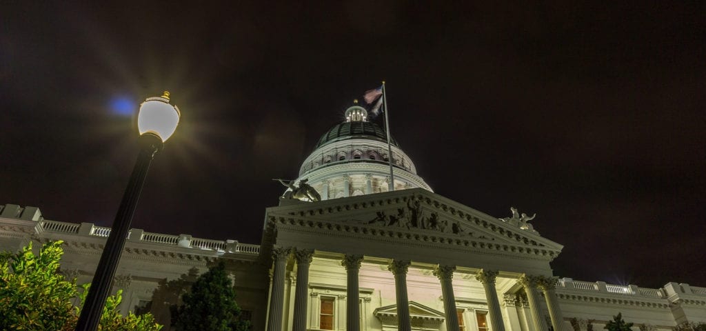 The California State Capitol Building in Sacramento, California photographed at nighttime.