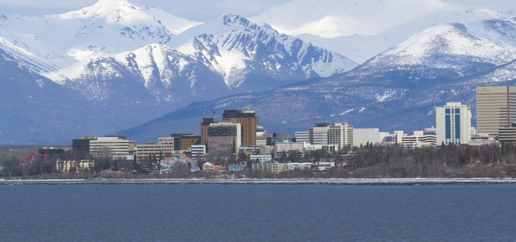 Downtown Anchorage, Alaska photographed from a boat several hundred meters from the shore.
