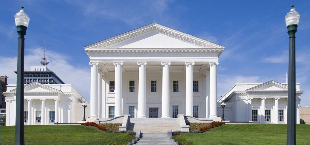 Virginia state capitol building, photographed from the steps leading across the lawn to the building's front door.