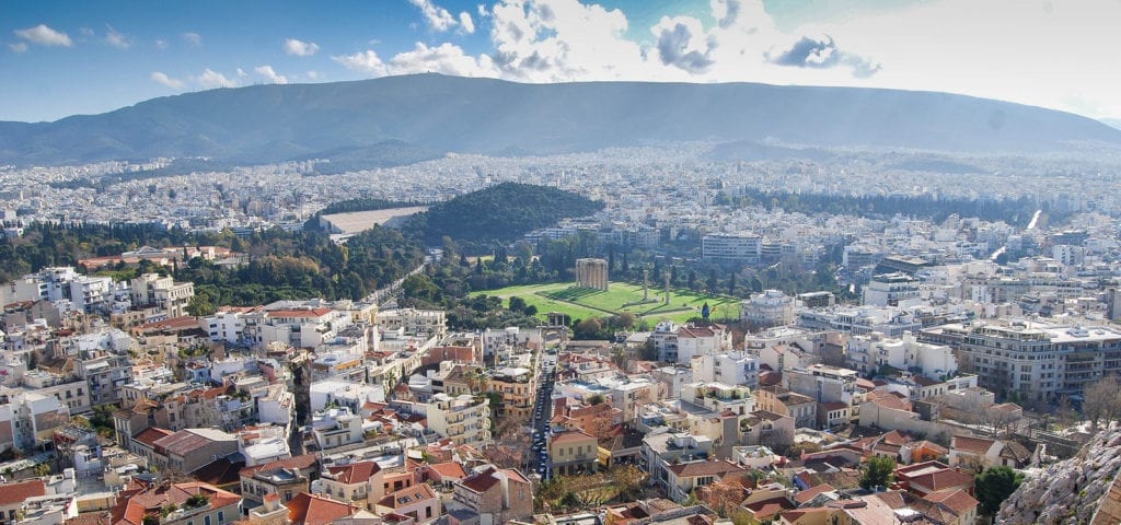 The Athens, Greece skyline, photographed on a clear, sunny day.