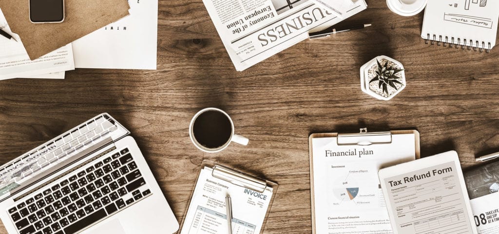 A flat layout of a business person's work station.