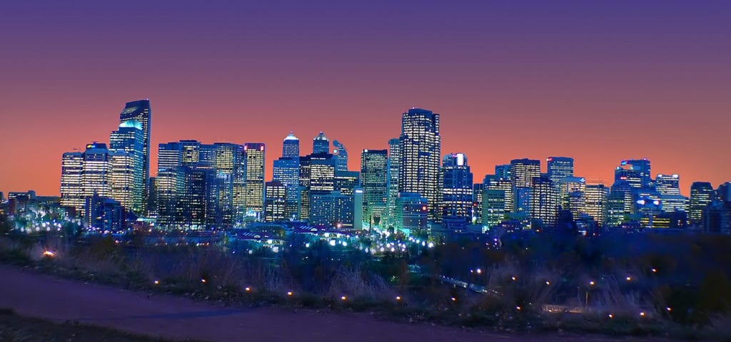 Nighttime photograph of the Calgary, Alberta city skyline.