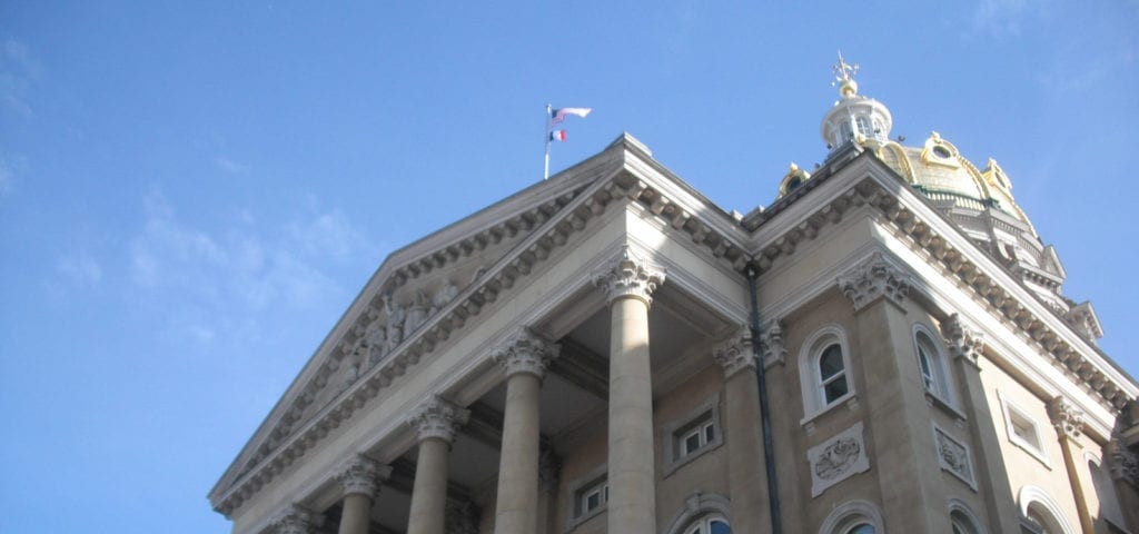 Photograph looking up from the base of the Iowa State Capitol Building.