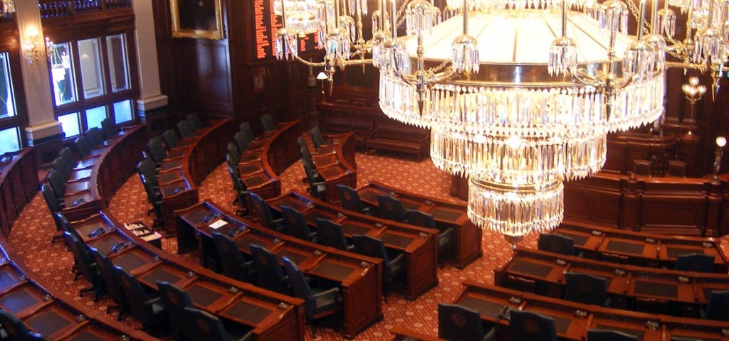 Chandelier and legislative hall inside of the Illinois Capitol Building.