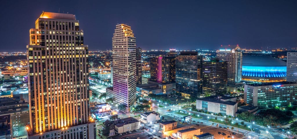 Nighttime view of the New Orleans skyline.