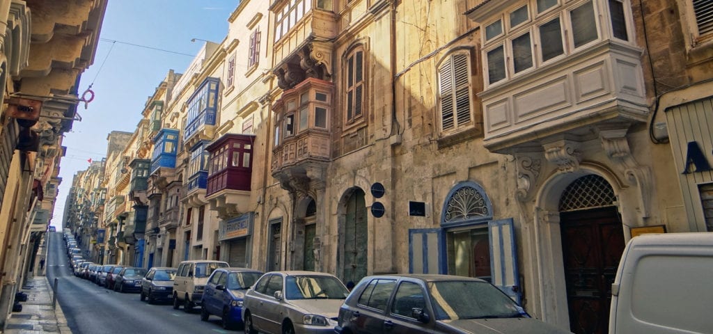 A long, straight street in Malta's capital city of Valleta.