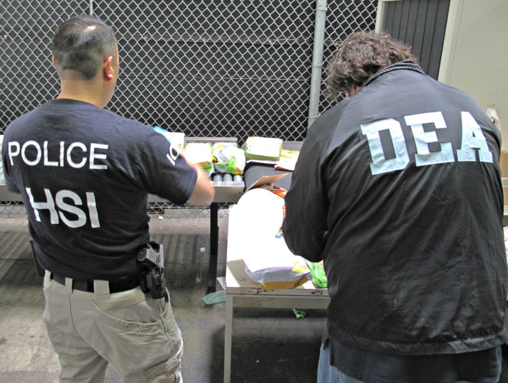 101315: Synergy III – 0006: DEA investigator teams up with ICE agent during Project Synergy III in Los Angeles, October 13, 2014.