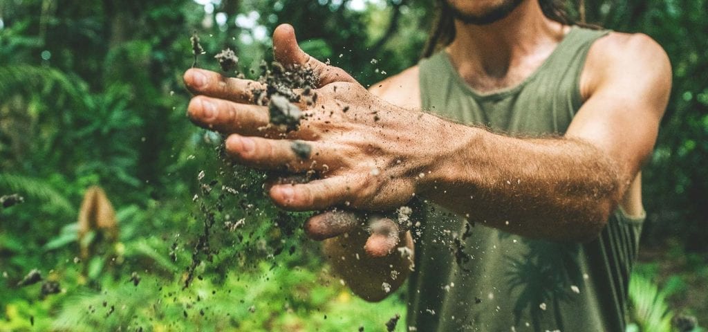 Agricultural Worker Cleans Hands